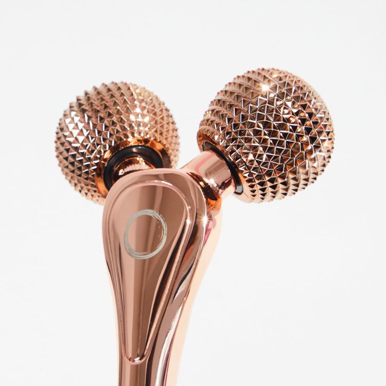 close up of epic skin tool angled upwards on white background